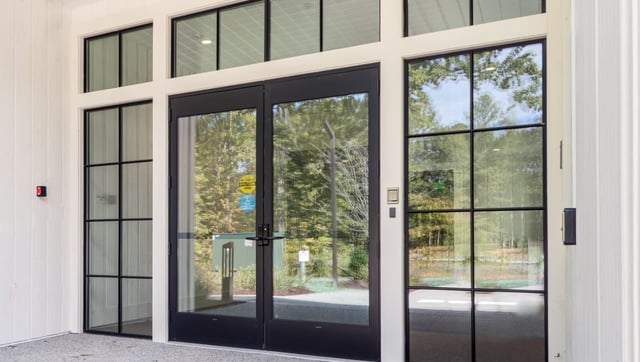 black-aluminum-framed-glass-entry-doors-and-sidelights-at-hope-church-in-richmond-virginia
