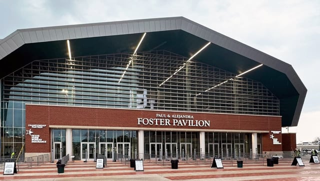 exterior-of-foster-pavilion-a-modern-arena-building-with-a-dark-angular-facade-and-brick-entrance-plaza