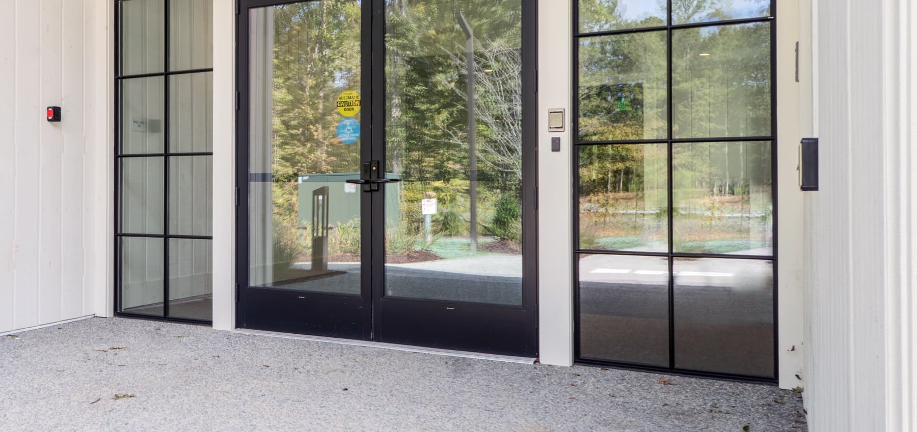 black-aluminum-framed-glass-entry-doors-and-sidelights-at-hope-church-in-richmond-virginia