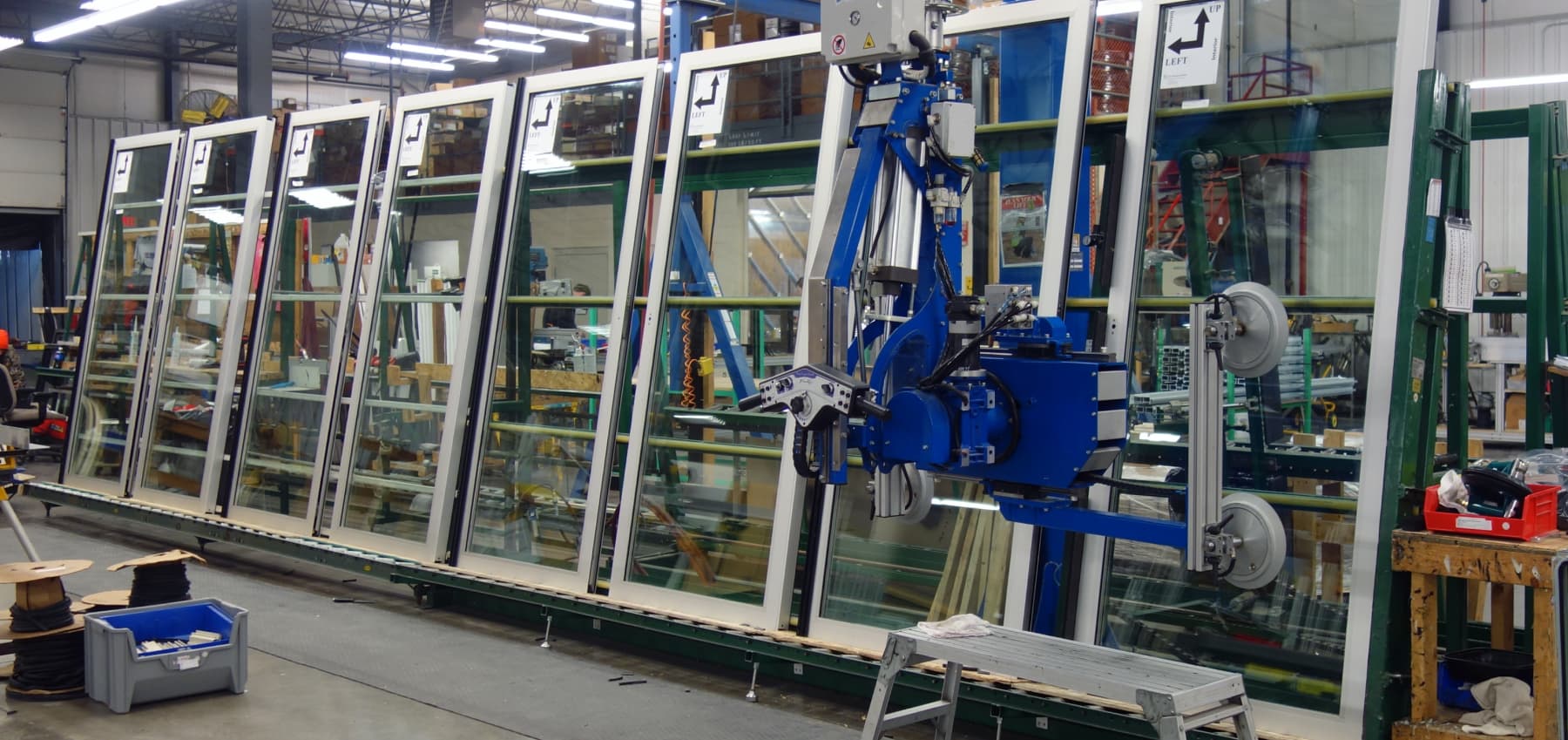 window-frames-and-glass-panels-being-assembled-on-the-manufacturing-floor