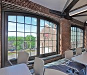 Natural light in a work space featuring historic replacement windows